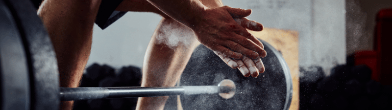 nexo_closeup hands and barbell