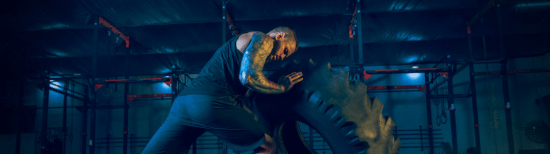 nexo_man flipping tire
