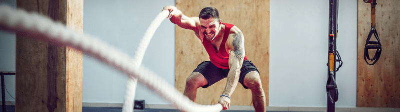 nexo_man working out with ropes